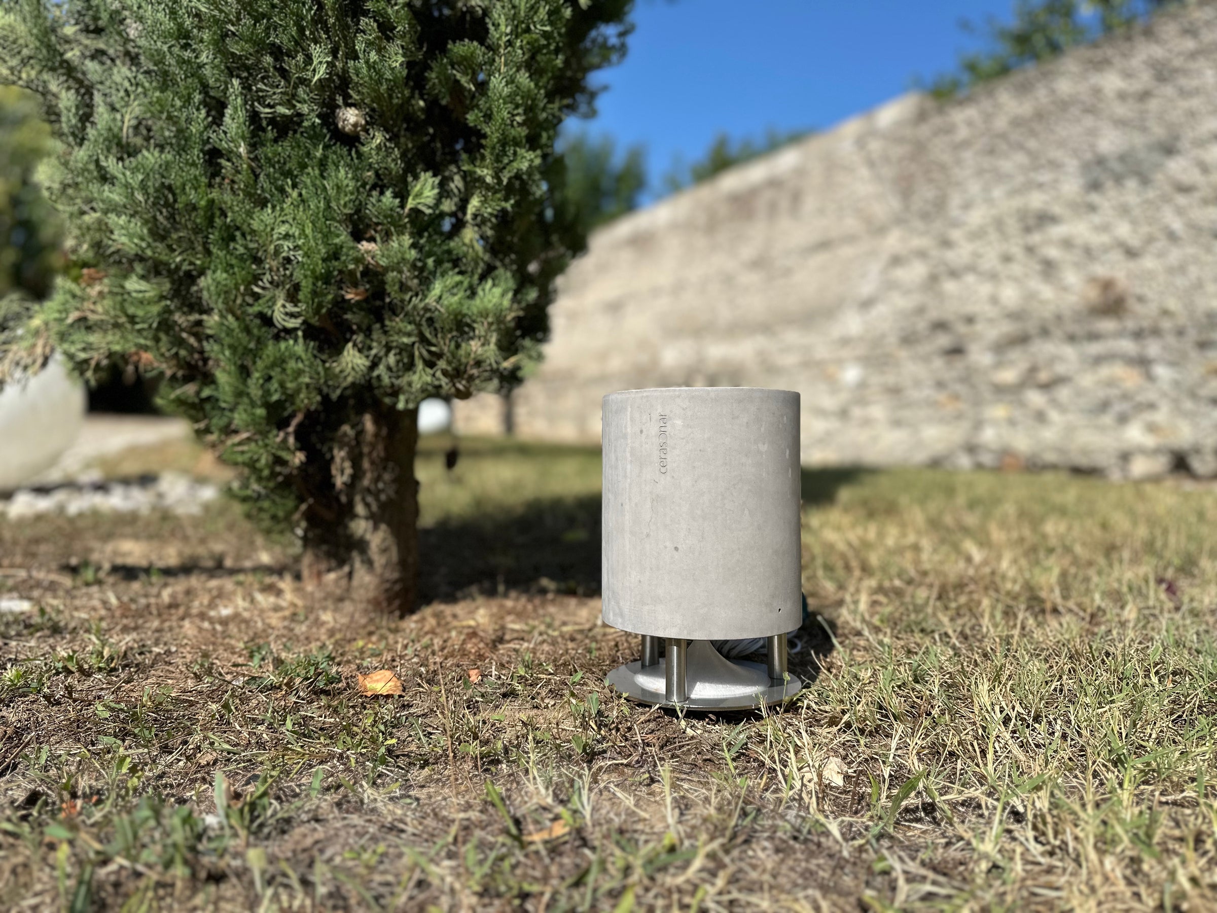 cerasonar concrete mini v2 integrated into a garden landscape
